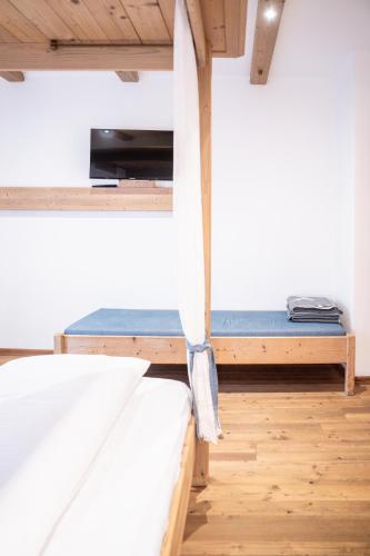 Letto o letti in una camera di Stauders Zimmer und Ferienwohnungen