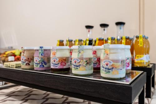 a group of bottles of beer on a table at Palazzo Porta Picta in Bergamo