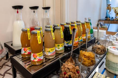 a group of bottles of beer on a table at Palazzo Porta Picta in Bergamo