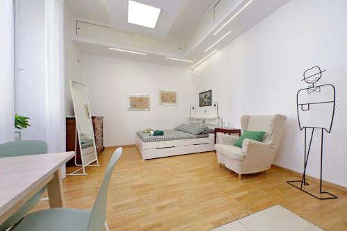 Un lugar para sentarse en Delizioso loft all'Esquilino