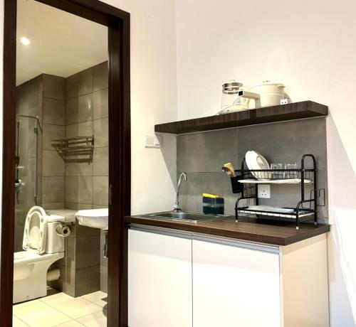 Kavenue Family Suite by CSEにあるキッチンまたは簡易キッチン