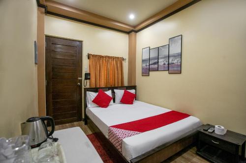 Postel nebo postele na pokoji v ubytování Rjat Guesthouse