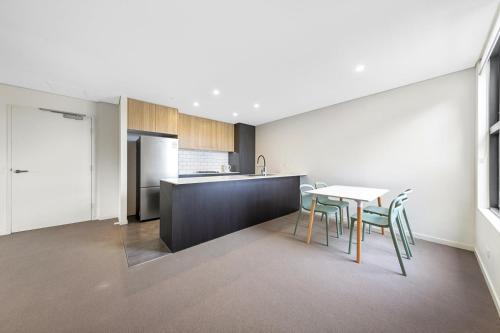 Η κουζίνα ή μικρή κουζίνα στο Lovely apartment in Manly Vale