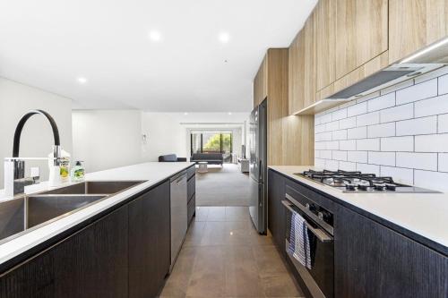 Η κουζίνα ή μικρή κουζίνα στο Lovely apartment in Manly Vale