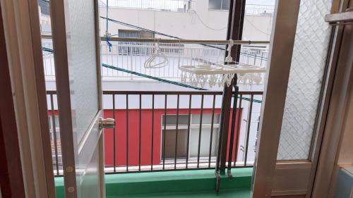 a view of a balcony from the door of a building at 瀬戸内塩上町 in Sambanchō
