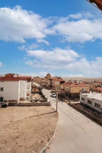a view of a city with buildings and a street at Taşkiran house in Ortahisar