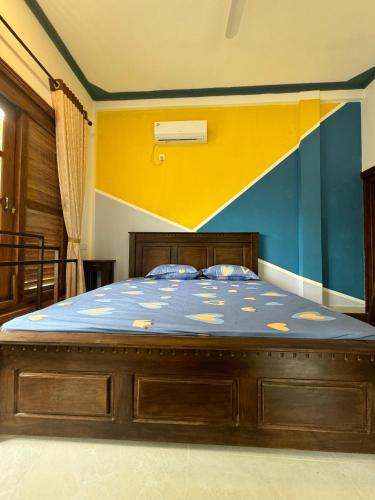 Postel nebo postele na pokoji v ubytování Hotel UK Pasikuda