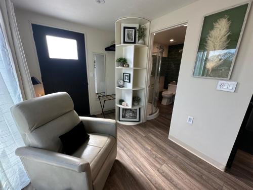 a living room with a couch and a chair at Riesling Retreat in Cottonwood