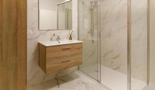 a bathroom with a sink and a shower at GORGEOUS VIEW Villa & Sauna, Golf Costa Adeje in Adeje
