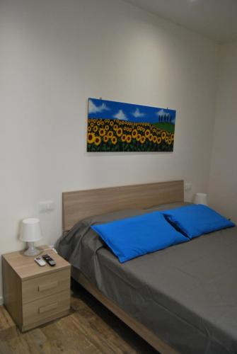 Postel nebo postele na pokoji v ubytování AngieFerru