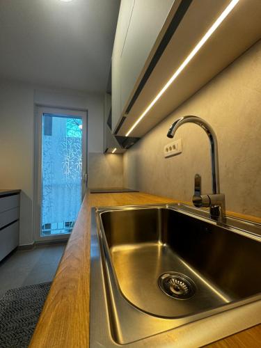 Kuchyňa alebo kuchynka v ubytovaní Apartment Navigare