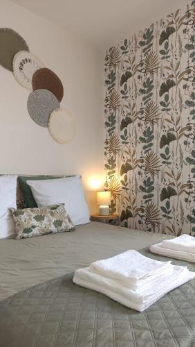 Ένα ή περισσότερα κρεβάτια σε δωμάτιο στο Appartement Lumineux hypercentre - Biscarrosse
