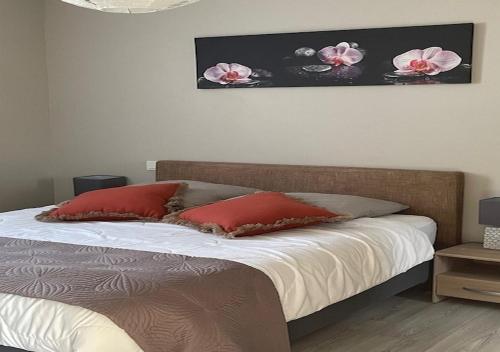 Ένα ή περισσότερα κρεβάτια σε δωμάτιο στο Les cottages du golf