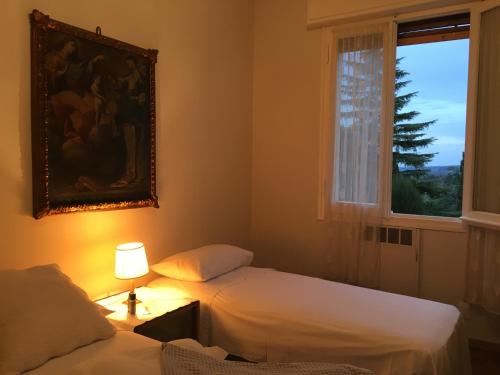Кровать или кровати в номере BASISA Bed&Breakfast