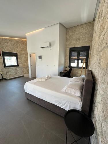 Ένα ή περισσότερα κρεβάτια σε δωμάτιο στο Exclusive new villa with private pool - 4BR