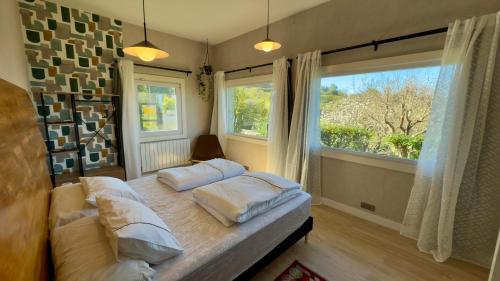 Postel nebo postele na pokoji v ubytování Uhara Sea Escape - Piscina privada