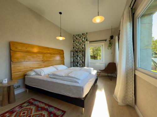 Postel nebo postele na pokoji v ubytování Uhara Sea Escape - Piscina privada