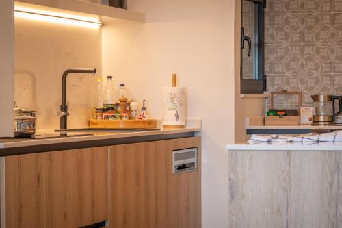a kitchen with a sink and a counter at 2br luxury design with sea views from every room in Sliema in Sliema