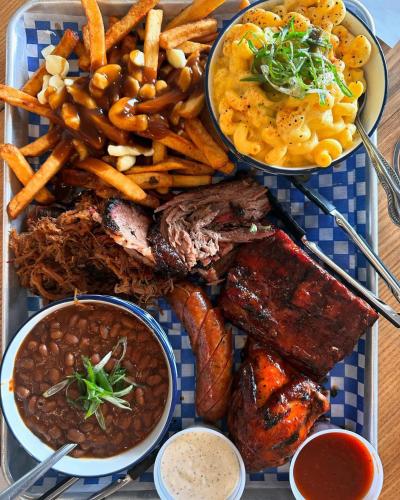 a plate of food with different types of food at Smokehouse Suites and Stay in Guelph