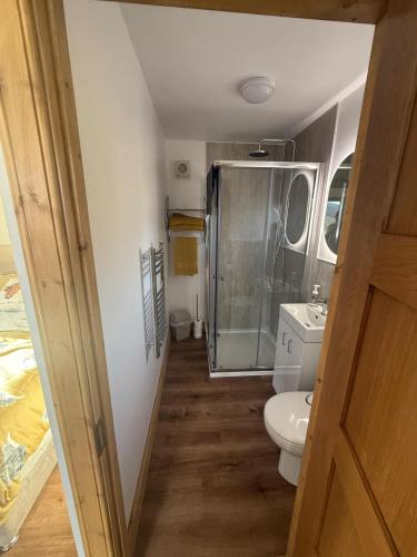 Ένα μπάνιο στο Ben Nevis Manor Studio with private Hot Tub