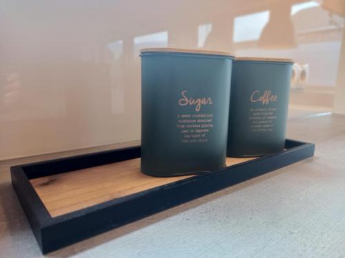 two candles sitting on a shelf in a room at Auszeit in Buch