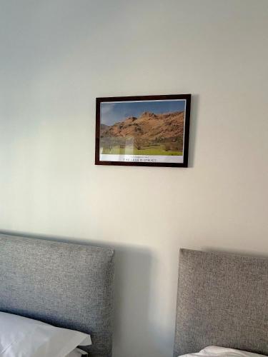 Postel nebo postele na pokoji v ubytování Lonsdale House Boutique Apartments