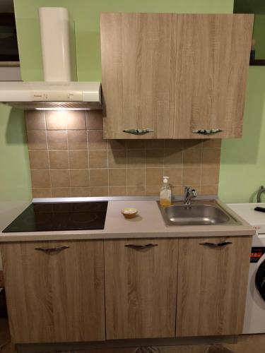 Kuchyň nebo kuchyňský kout v ubytování D&M Home