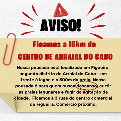 a sign that readsfamous a do cao at Suítes Brandi in Arraial do Cabo
