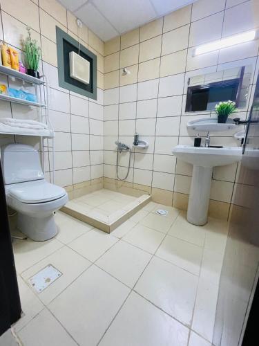 Ένα μπάνιο στο Rak luxury Apartments