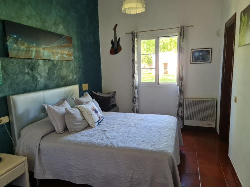 Voodi või voodid majutusasutuse Casa rural 6-9 personas toas