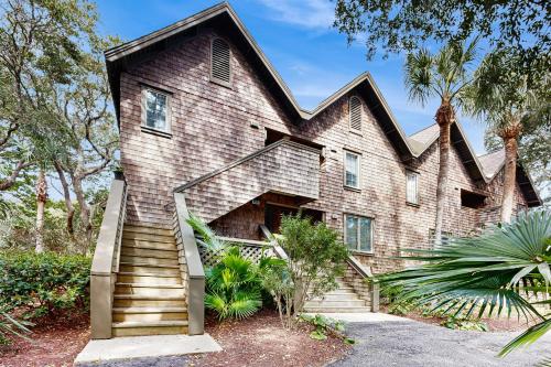 a brick house with stairs in front of it at Mariner's Watch 4288 in Kiawah Island