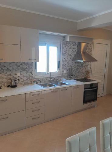 Η κουζίνα ή μικρή κουζίνα στο Peri's apartment