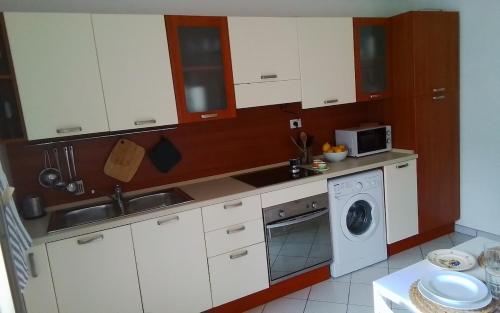 Una cocina o cocineta en Casa Pascal immobile singolo con Terrazza Privata