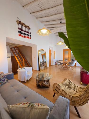 a living room with a couch and a table at Urban Loft - La Conce in Cáceres