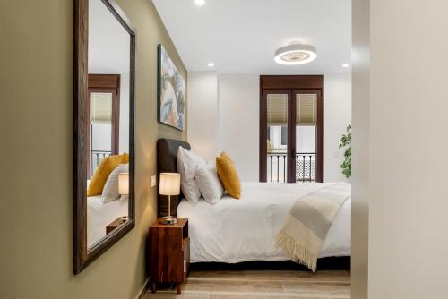 Ένα ή περισσότερα κρεβάτια σε δωμάτιο στο Casa Bonbini II