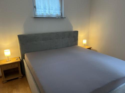 Katil atau katil-katil dalam bilik di Ferienhaus mit Traumblick