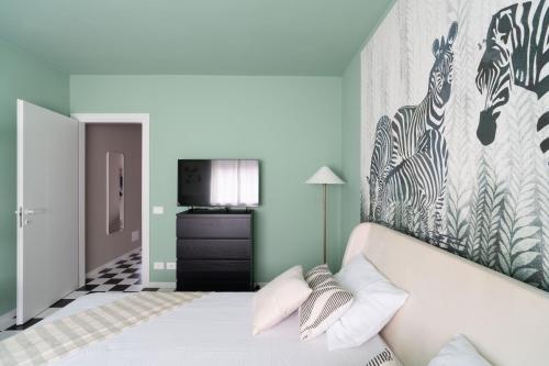 Ένα ή περισσότερα κρεβάτια σε δωμάτιο στο Jungle Apartment