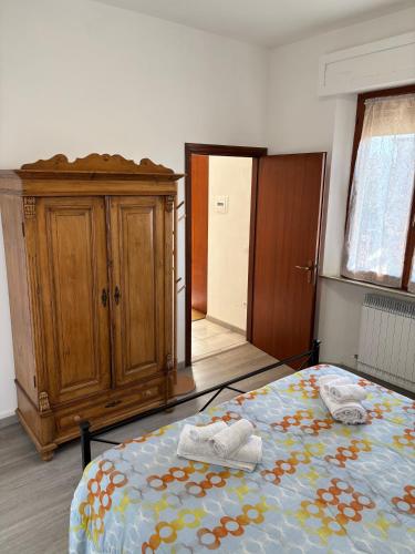 Katil atau katil-katil dalam bilik di Alloggio Turistico Trasimeno II Castiglione Del Lago