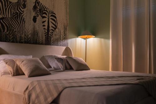 Ένα ή περισσότερα κρεβάτια σε δωμάτιο στο Jungle Apartment