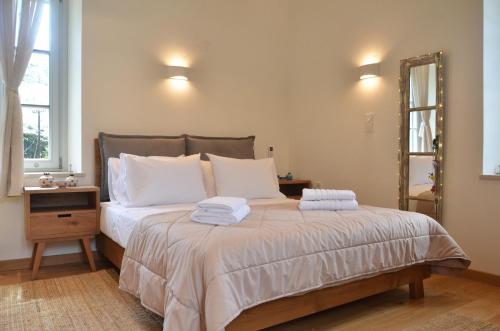Ένα ή περισσότερα κρεβάτια σε δωμάτιο στο Maison Des Clementines