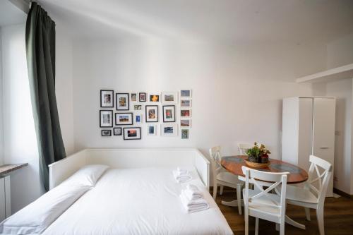 Ένα ή περισσότερα κρεβάτια σε δωμάτιο στο Splendido Bilocale in Zona Chinatown