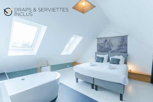 Un ou plusieurs lits dans un hébergement de l'établissement TY LAOUEN - Maison bretonne de charme avec sauna