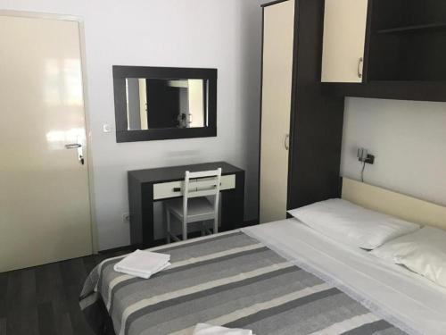 Кровать или кровати в номере Apartments Vala 3