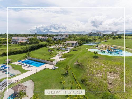 an aerial view of a resort with a swimming pool at Escapada Exclusiva en Casamar, playa surf y golf in San Carlos
