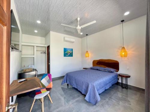 Postel nebo postele na pokoji v ubytování Hotel Huacas