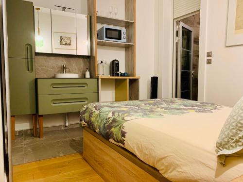 Cama o camas de una habitación en TANG Home-Bordeaux Hyper Centre