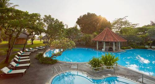 an overhead view of a pool at a resort at SOL by Meliá Benoa Bali All inclusive in Nusa Dua