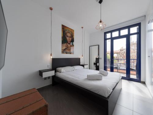 Ένα ή περισσότερα κρεβάτια σε δωμάτιο στο Duplex in Maspalomas near Meloneras Beach