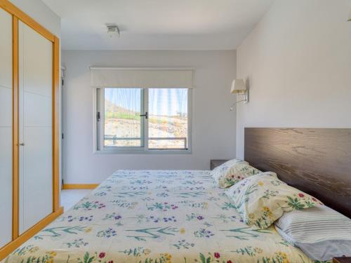 Ένα ή περισσότερα κρεβάτια σε δωμάτιο στο Chalet in Salobre with Private Heated Pool