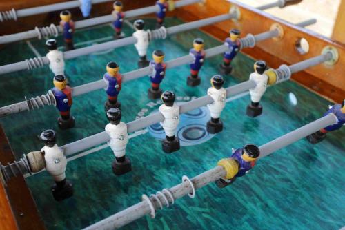 a group of lego people in a pool of water at Casa Andina Standard Chincha in Chincha Alta